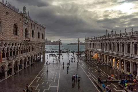 The St. Mark's square in Venice during bad weather and high tide Stock Photos