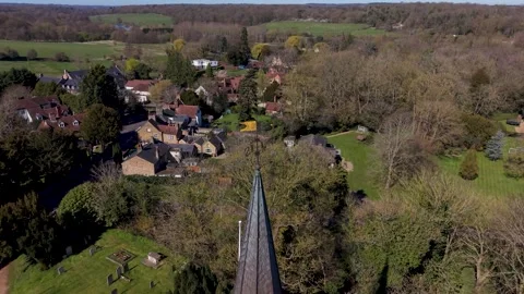 St Mary's church drone pullback from golden weather vane, rising reveal of Stock Footage 332787873