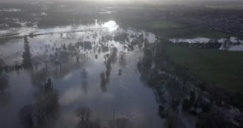 St Neots - River Ouse Burts Its Banks After Storm Bella -  Riveside Park 4K Stock Footage 145752818