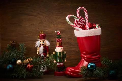 St. Nicholas Day. Red boot with sweets, spicy ginger cookies and gifts for Stock Photos