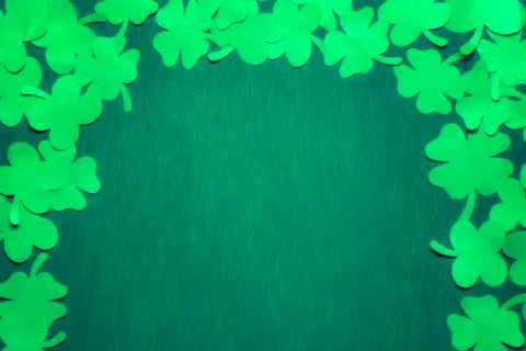 St Patrick background with paper Shamrock Stock Photos