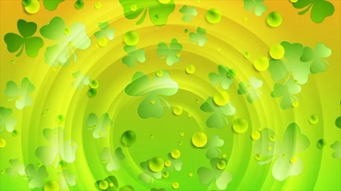 St Patrick Day green orange abstract motion background with shamrock leaves Stock Footage 330486625