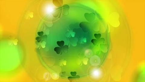 St Patrick Day green orange abstract motion background with shamrock leaves Stock Footage 330487571