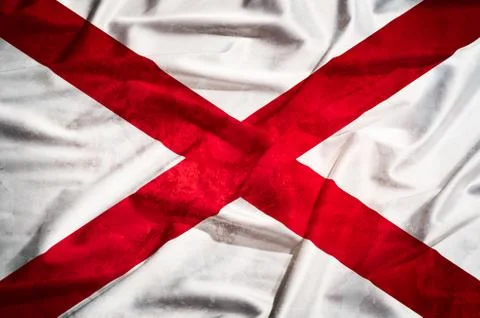 St patrick flag on a silk drape waving Stock Photos