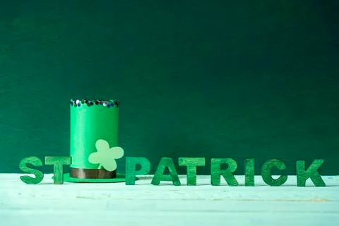 St Patrick words and a leprechaun hat Stock Photos