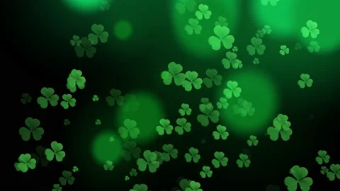 ST Patrick's day background green clover leaf bokeh lights defocused for ST Video stock 145685311