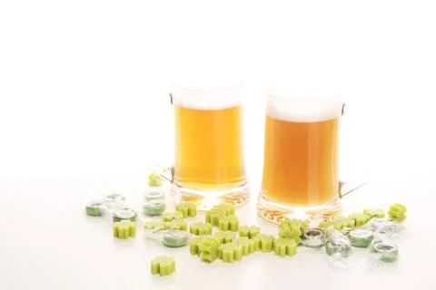 St patricks day with Beer on a table. Saint celebration with lucky shamrock Stock Photos