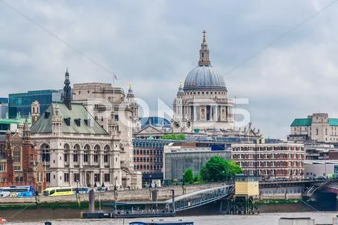 St Paul Cathedral and Millennium Bridge, London, UK. Stock Photos