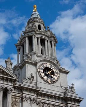 St. Paul's Cathedral Clock Tower Against a Blue Sky Stock Photos