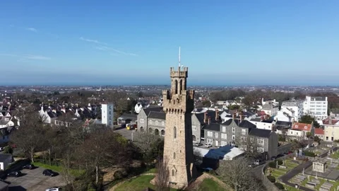 St Peter Port Guernsey close circling drone footage of the Arsenal tower,fire Stock Footage 334086689