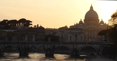 St. Peter’s Basilica (Vatican City) in Rome, Italy at sunset Stock Footage