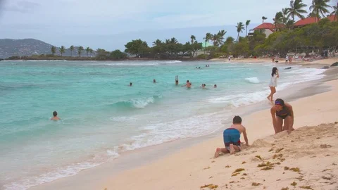 St. Thomas US Virgin Islands Tourists Enjoying Saint John Bay Beach Stock Footage 75398363