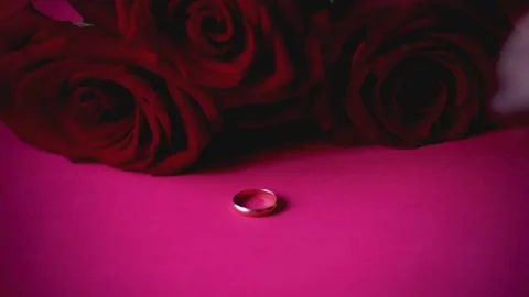 St Valentines Day romantic video with golden rings, proposal symbol . Wedding Stock Footage 168070818
