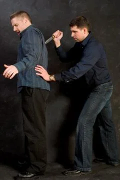 Stab in the back Stock Photos