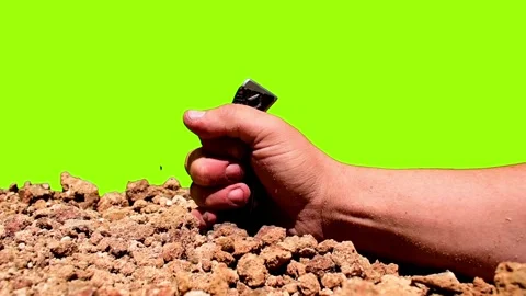 Stabbing a knife in to rocks (Green Screen) Stock Footage 146251960