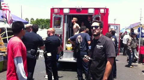 Stabbing suspect treated for injuries in handcuffs Stock Footage 40368146