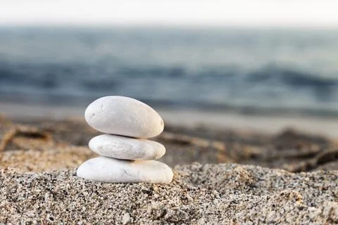 Stability and harmony, stack or pile of balancing rock stones on summer Foto stock