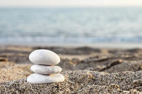 Stability and harmony, stack or pile of balancing rock stones on summer Foto stock