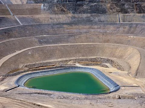 STABILIZATION AND WATERPROOFING OF OPEN-PIT MINES WITH GEOSYNTHETIC MATERIALS Stock Photos