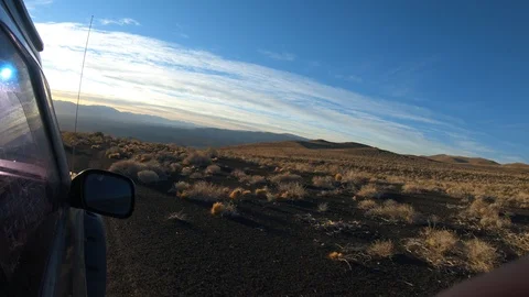 Stabilized camera movement over from outside a van at sunset golden hour Stockbeeldmateriaal 91618800