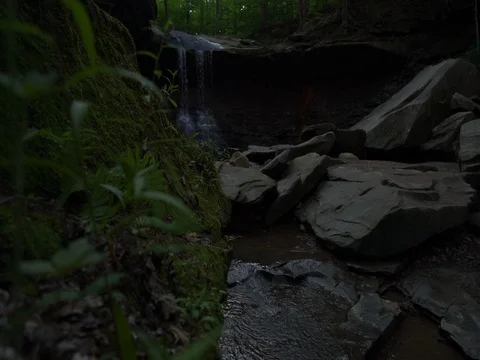 Stabilized Camera moving towards Ohio Waterfall Stock Footage 77102680