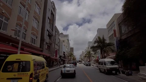 Stabilized driving shot down kokusai street Naha Okinawa Japan Stock Footage 123810274