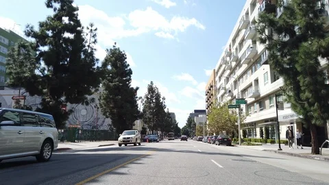 Stabilized driving shot through downtown Los Angeles in 4K Stock Footage 119993723