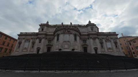 Stabilized forward walk of ancient Roman palace in large square behind fence Stock Footage 322115561