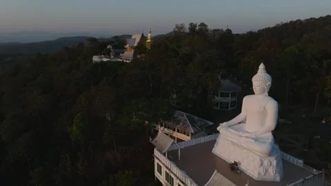 Stabilized Golden Hour Close-Up of Buddha  Wat Phra That Chom Kitti Stock Footage 333632820