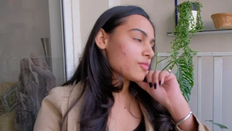 Stabilized handheld pan from left to right on close-up faces of coworkers seated Video stock 101362994