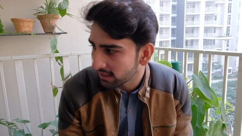 Stabilized handheld pan from left to right on close-up faces of coworkers having Stock Footage 101363007