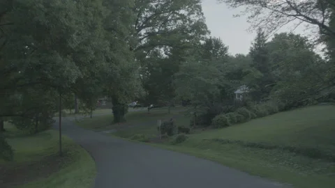 Stabilized high vault shot through a small street Stock Footage 149142874