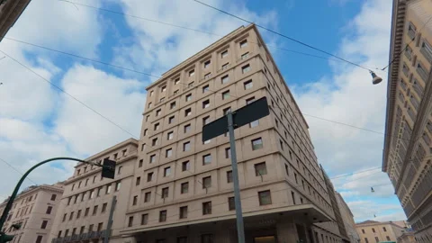 Stabilized low upward right-to-left walk of beige rectangular city building faca Stock Footage 322116263