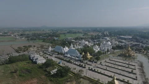 Stabilized Rear to Side Wide Shot of the White Temple  Wat Rong Khun Stock Footage 333632793