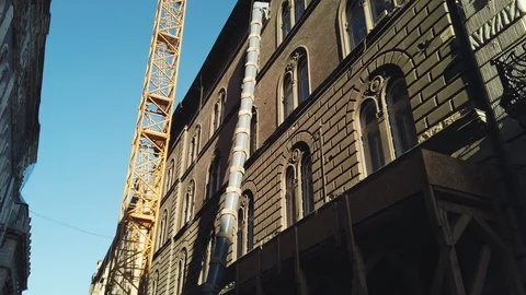 Stabilized shooting of a Crane from street level Stock Footage 103249770