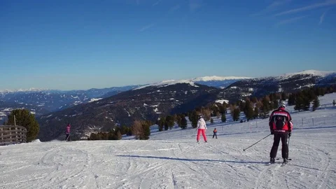 Stabilized shot of Group of people skiing down the slope Stock Footage 84670004
