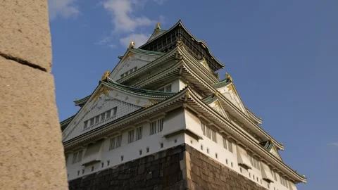 Stabilized Shot of Osaka Castle and Garden During Golden Hour Stock Footage 314085134