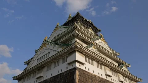 Stabilized Shot of Osaka Castle and Garden During Golden Hour Stock Footage 314085137
