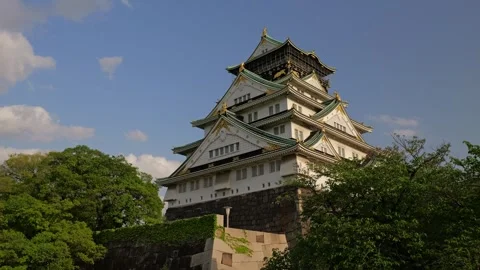 Stabilized Shot of Osaka Castle and Garden During Golden Hour Stock Footage 314085153