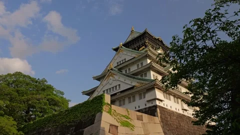 Stabilized Shot of Osaka Castle and Garden During Golden Hour Stock Footage 314085154