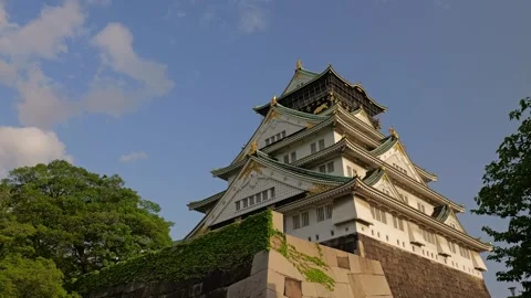 Stabilized Shot of Osaka Castle and Garden During Golden Hour Stock Footage 314085157