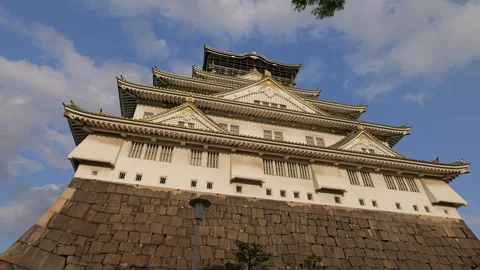Stabilized Shot of Osaka Castle and Garden During Golden Hour Stock Footage 314085174
