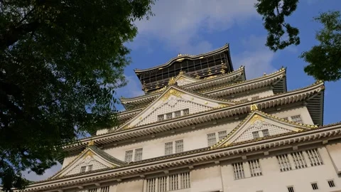 Stabilized Shot of Osaka Castle and Garden During Golden Hour Stock Footage 314085176