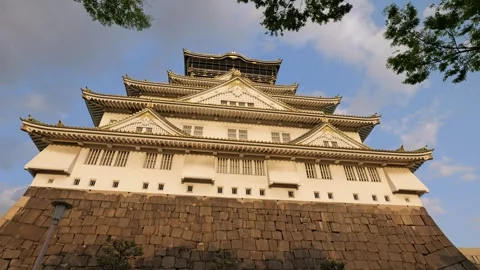 Stabilized Shot of Osaka Castle and Garden During Golden Hour Stock Footage 314085199