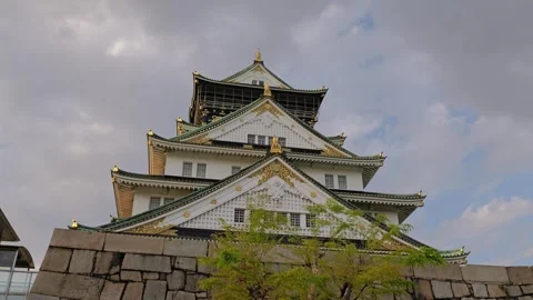 Stabilized Shot of Osaka Castle and Garden During Golden Hour Stock Footage 314085219