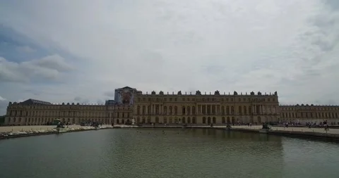 Stabilized walk along the pond in front of Versaiiles Palace, France, near Paris Stock Footage 167821443