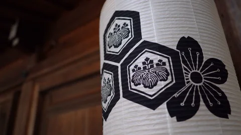 Stabilizer shot of decorative lantern inside Kushida Shrine Stock Footage 127912305