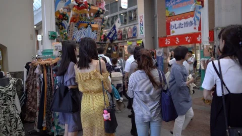 Stabilizer shot of public visitors taking photo of decoration float or Stock Footage 127912095