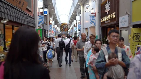 Stabilizer shot of public visitors viewing of decoration float or "Kazariyama" Stock Footage 127912394