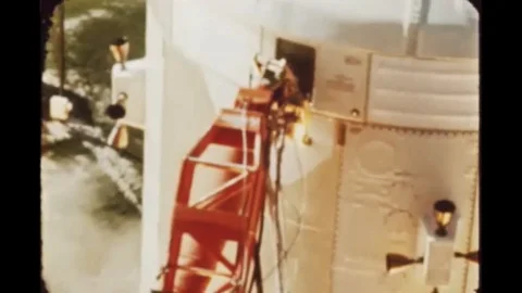 The stablizers holding the rocket on the launch pad releasing in slow motion, Stock Footage 112533781